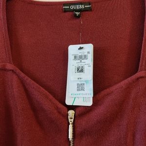 Guess Medium wine/ burgundy rose colored shirt.